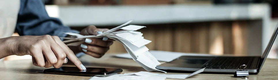 a contractor adding receipts from his construction project